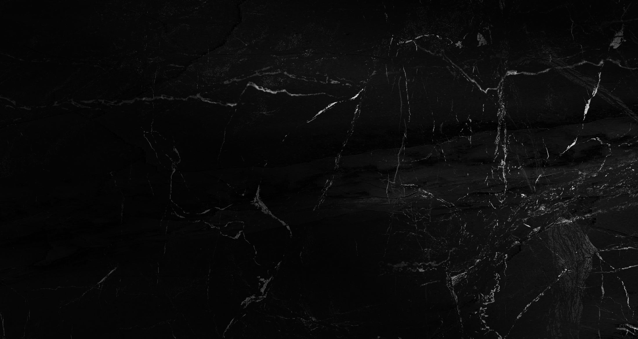 Black marble texture with white veining.