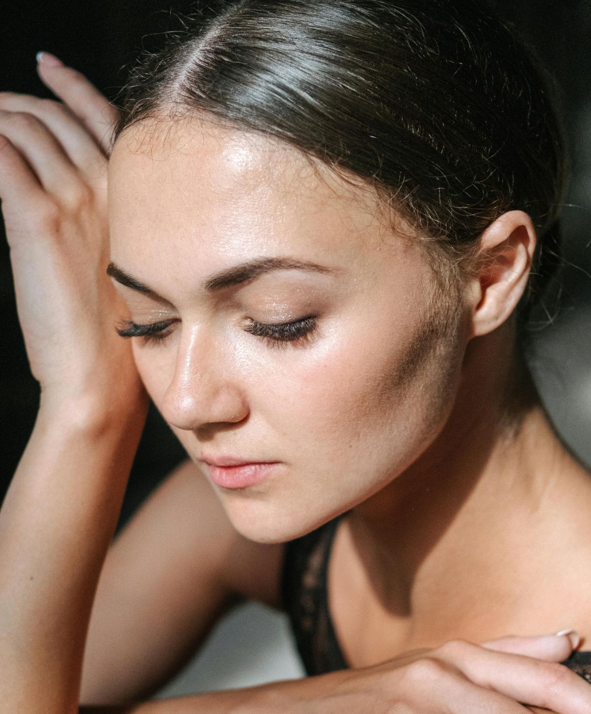 Close-up portrait of Avon dermal fillers model with brown eyes.