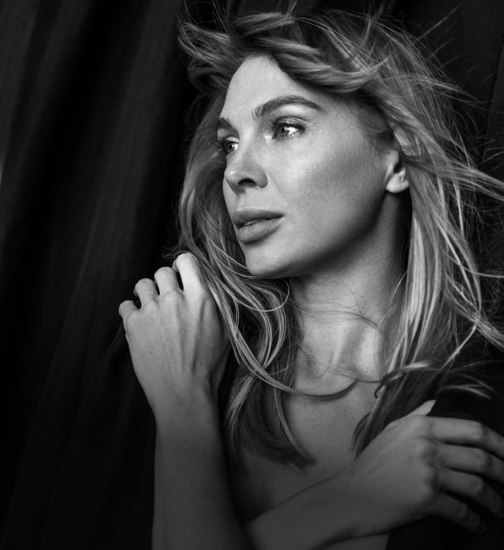 Black and white portrait of a woman at an Avon med spa.