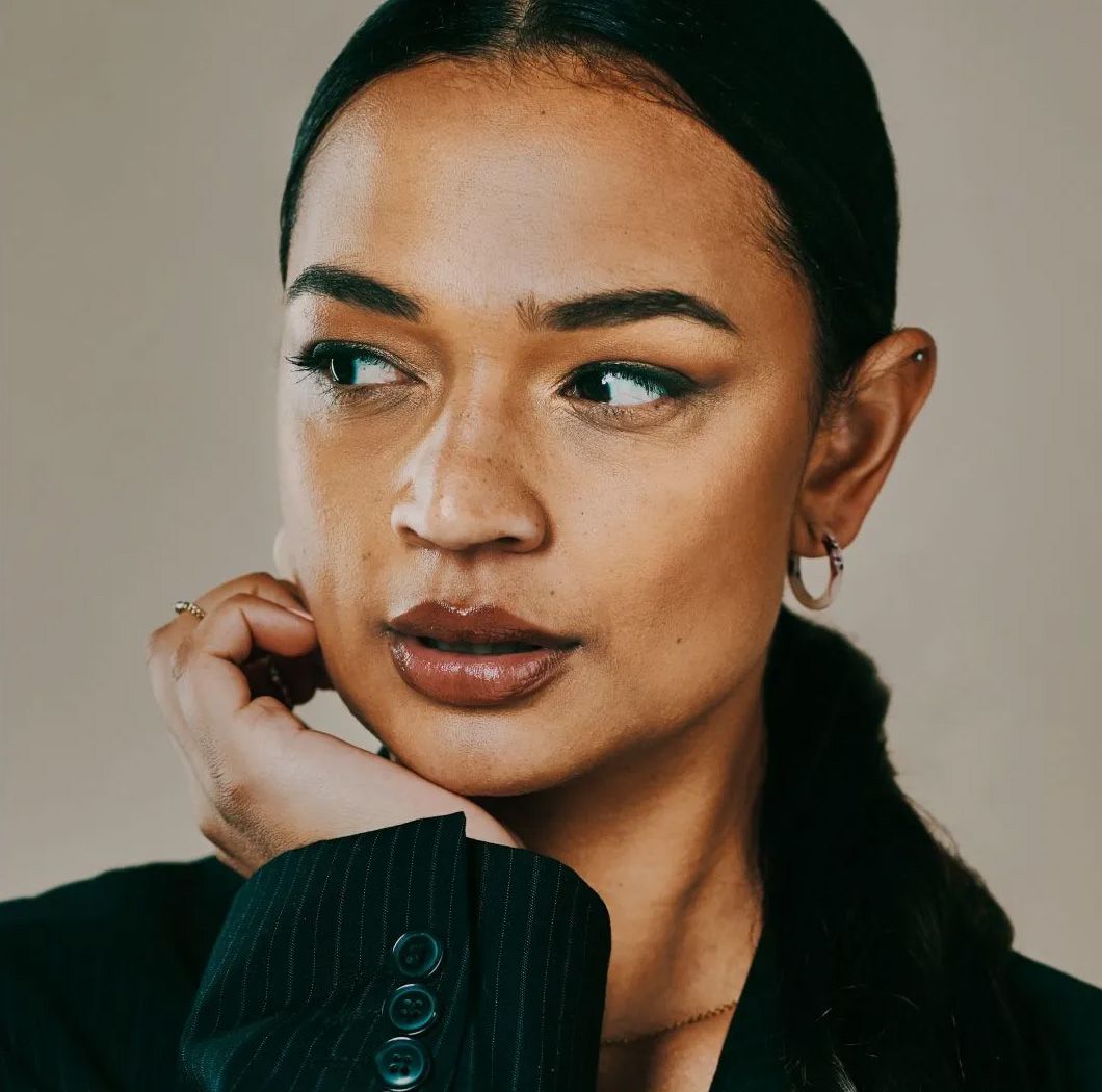 Avon surgical center woman with contemplative expression.